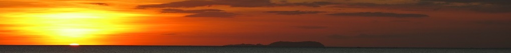 Apo Island im Sonnenuntergang - Bild aufgenommen vom Siquijor im Royal Cliff Resort